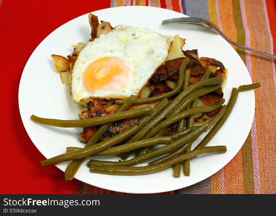 French bean and scrambled egg on the plate