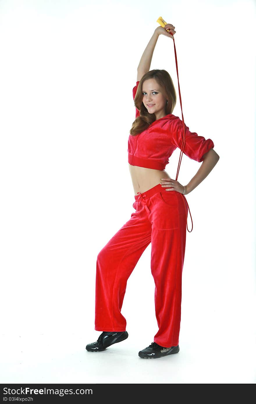 The slender girl in a red tracksuit