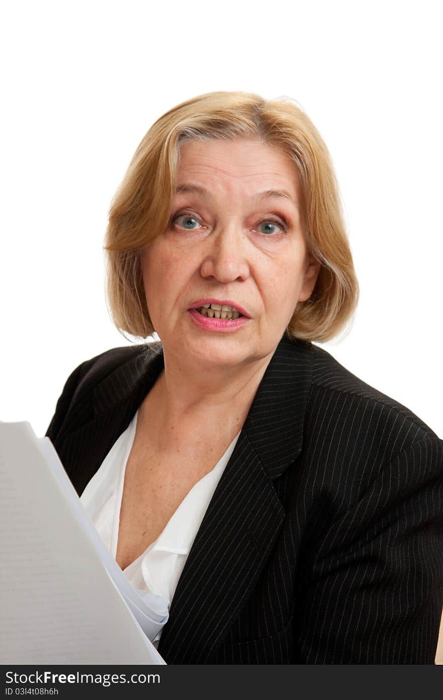 Senior Woman in black suite on white background. Blond hair. Shot in studio. Senior Woman in black suite on white background. Blond hair. Shot in studio.