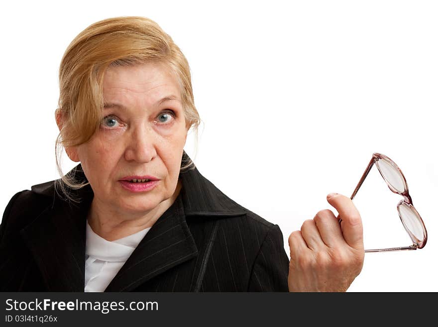 Senior Woman with glasses in black suite on white background. Blond hair. Shot in studio. Senior Woman with glasses in black suite on white background. Blond hair. Shot in studio.