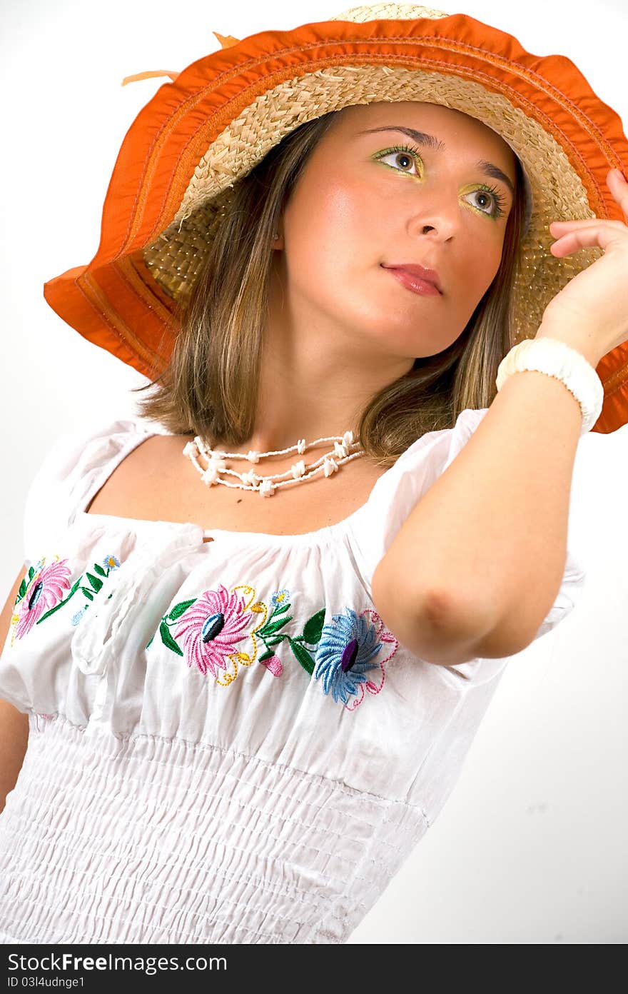 Portrait of a young woman with hat