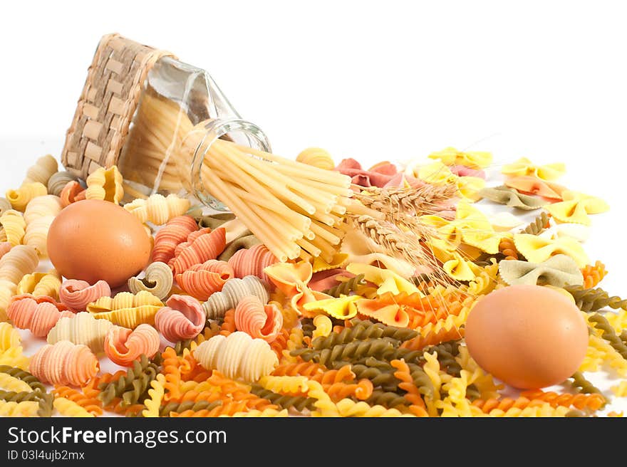 Different kinds of italian pasta on white background