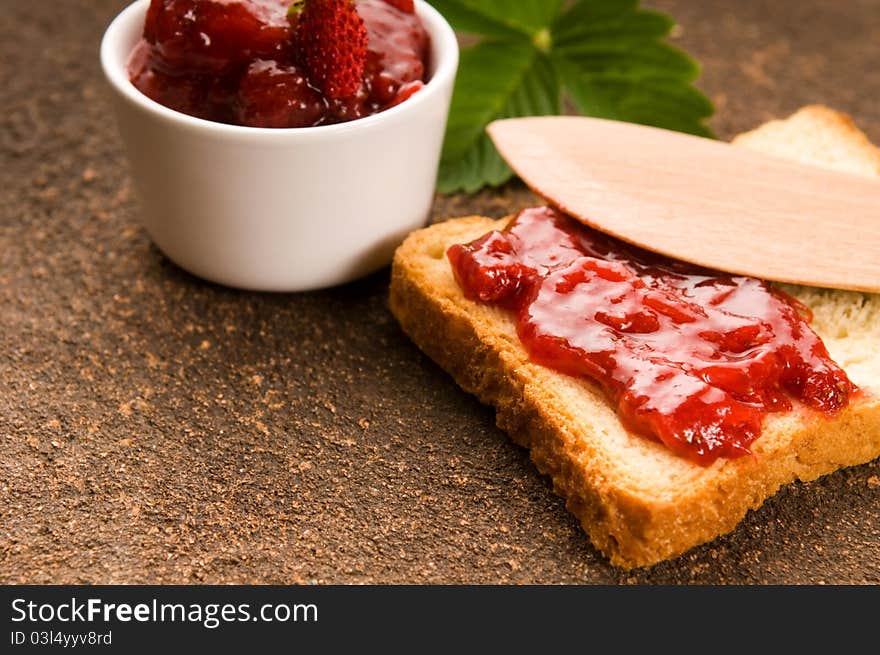 Breakfast of cherry jam on toast