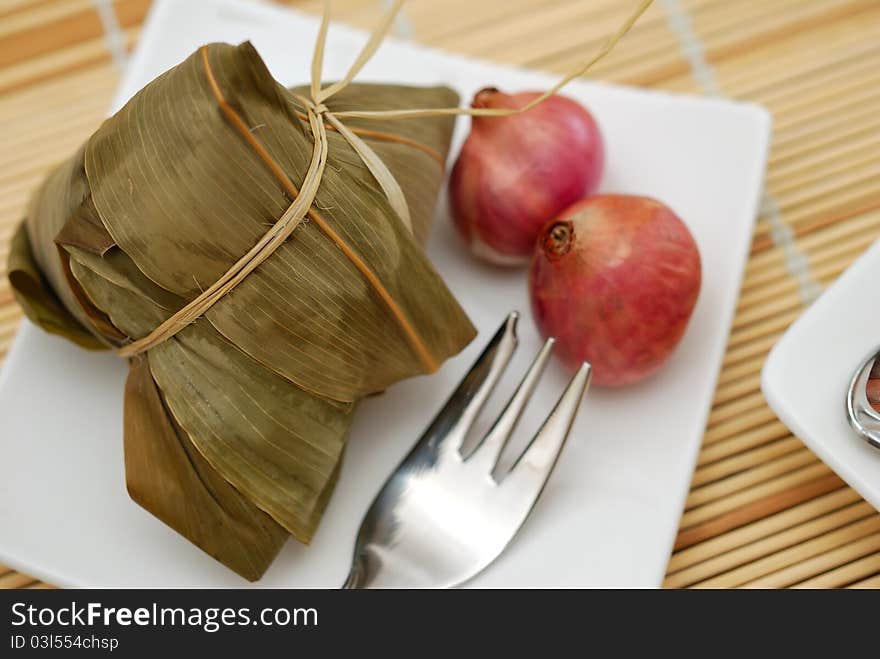 Traditional and creative Asian style delicacy on white plate for a meal. Traditional and creative Asian style delicacy on white plate for a meal.