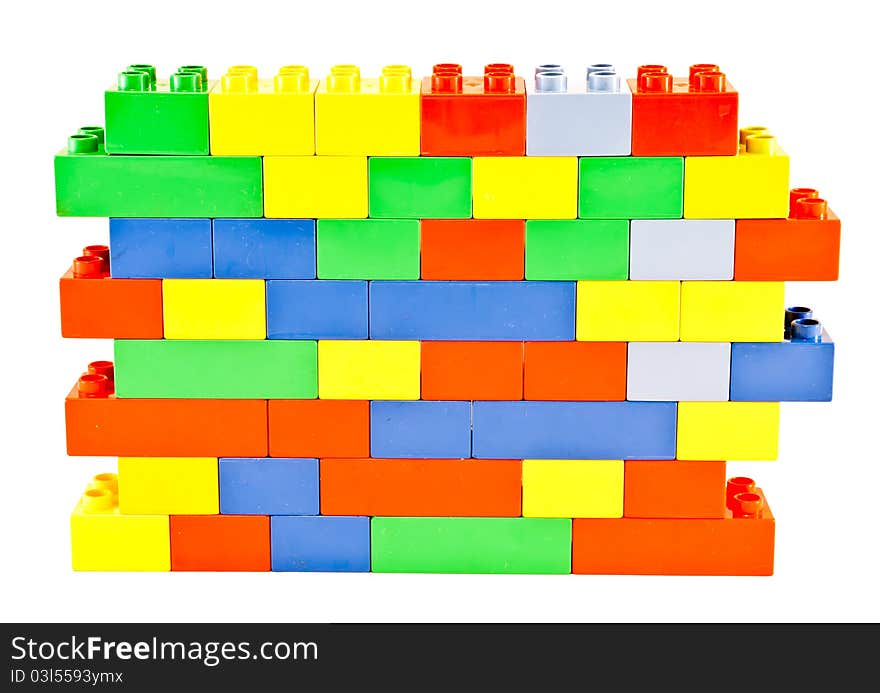 Plastic building blocks on white background. Bright colors.