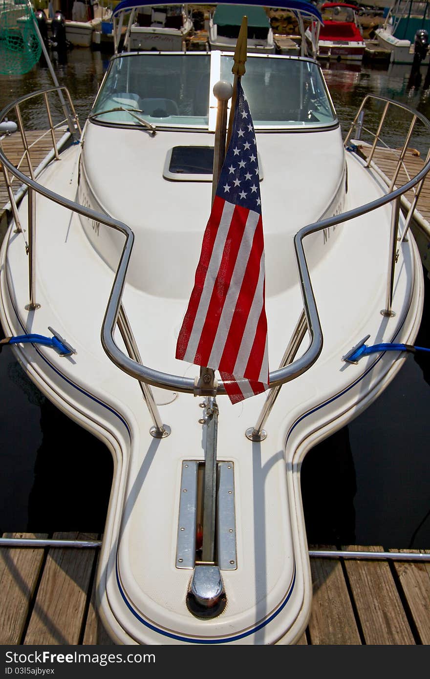 Motor boat docked in the marina.