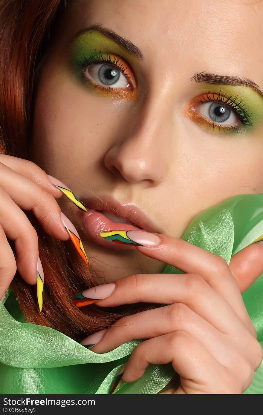 Girl with colorful makeup and beautiful nails. Girl with colorful makeup and beautiful nails