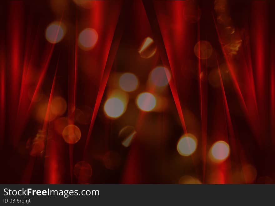 Blurred light and red silk curtains