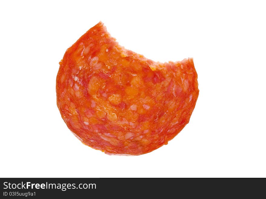 Single slice of salami witha missing bite