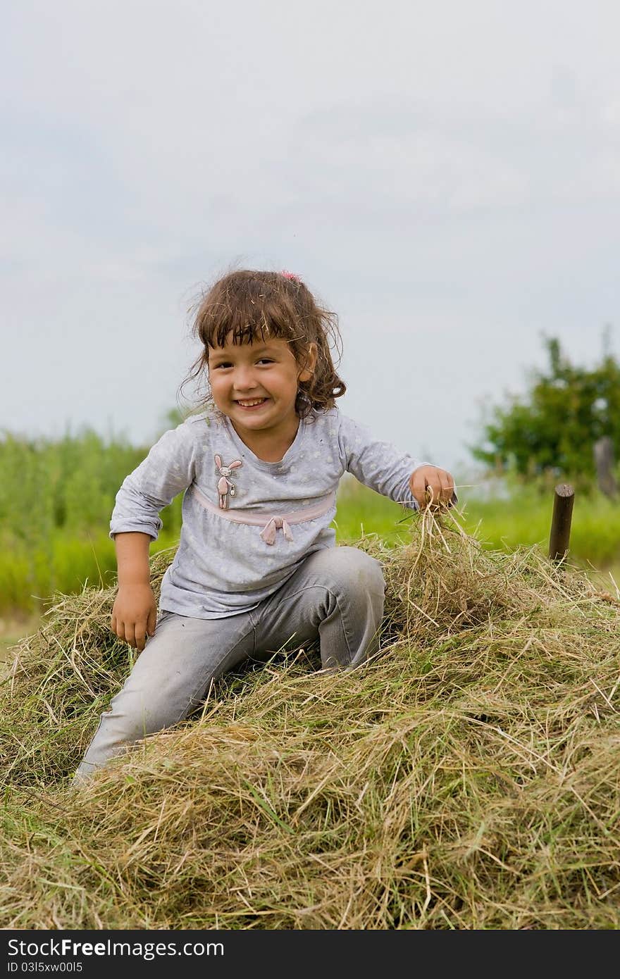 Girl on the hay