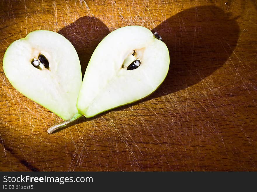 Pear On The Wood Table