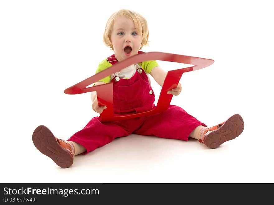 Child with red dart, conception business, on white background.