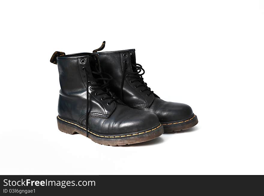 A highly meritorious black leather boots worn. A highly meritorious black leather boots worn