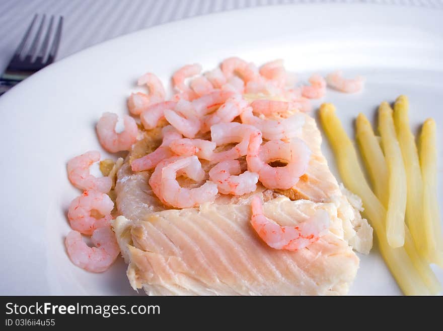 Smoked whitefish with shrimps and asparagus on the dish. Smoked whitefish with shrimps and asparagus on the dish.