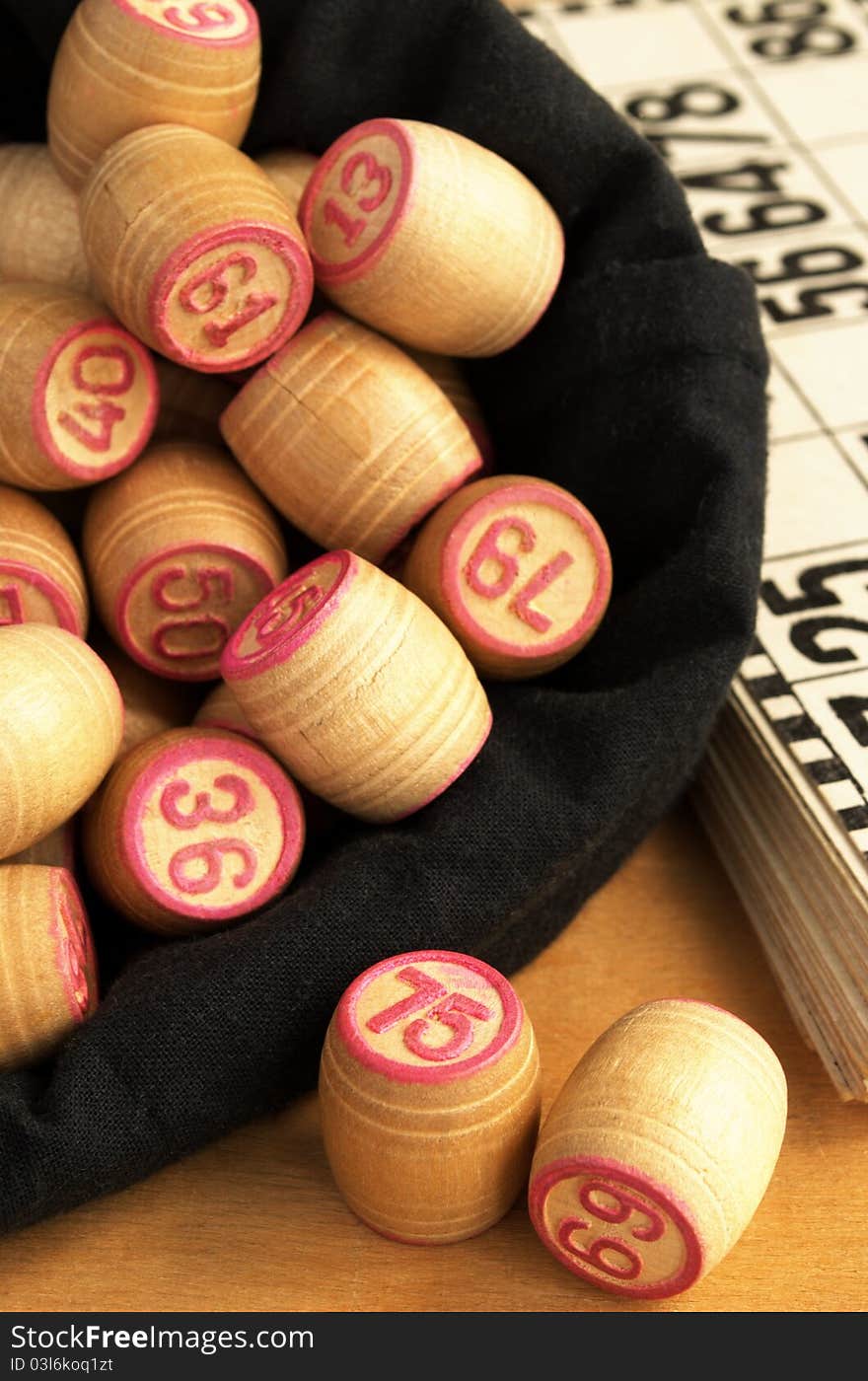 Wooden barrels with lotto games in red digits