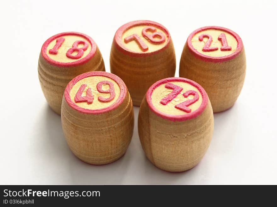 Wooden barrels with lotto games in red digits