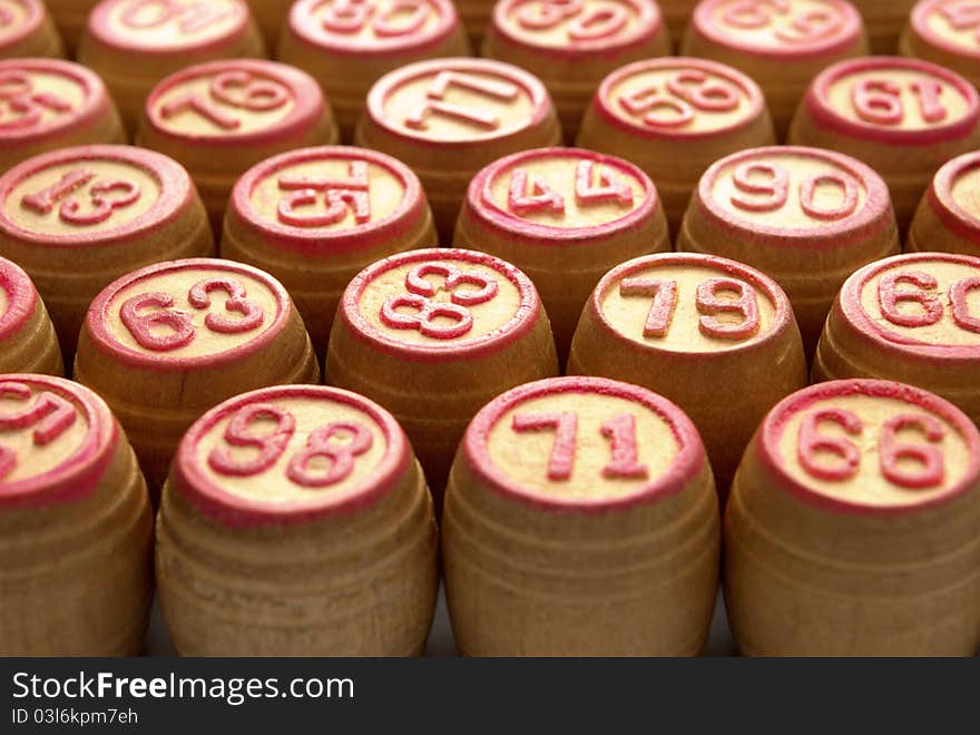 Wooden barrels with lotto games in red digits