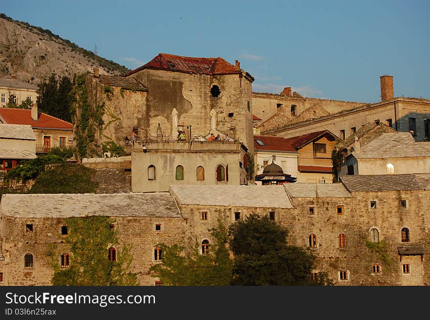 Buildings lit by the setting sun at Mostar, Bosnia and Herzegovina