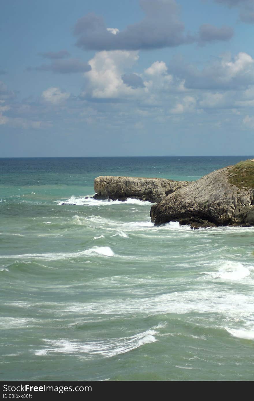 View stormy sea on a sunny day