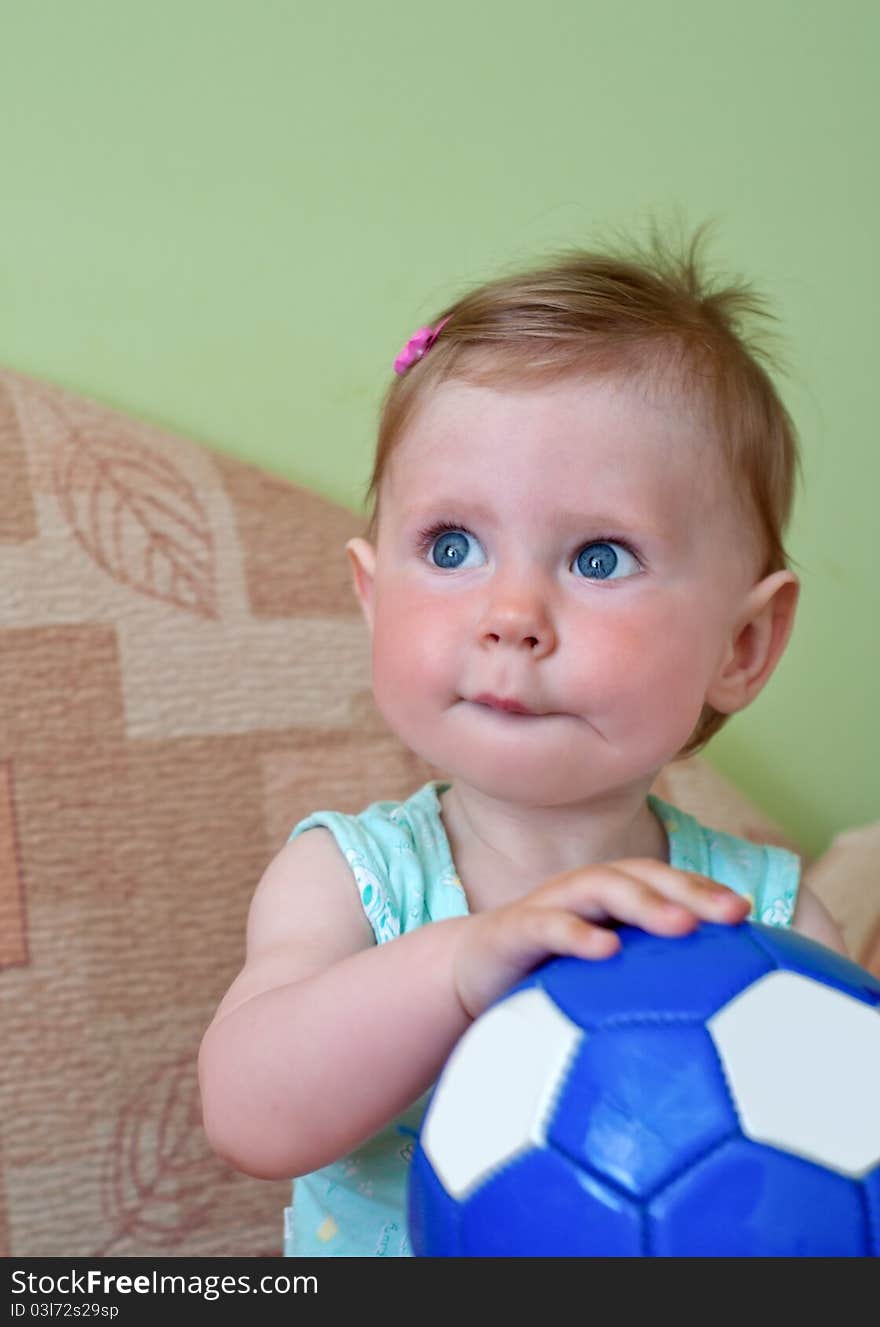 Lovely little girl plays with ball. Lovely little girl plays with ball