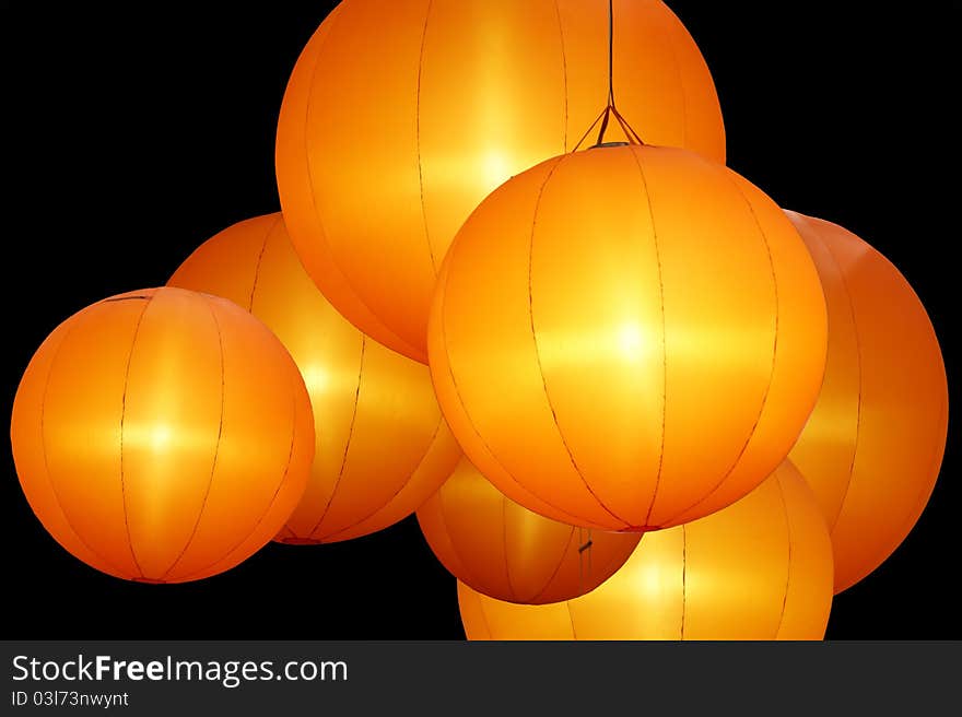 Warmly colored balloon lamps