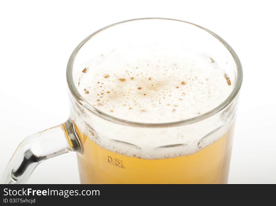 Beer in a mug isolated on white background