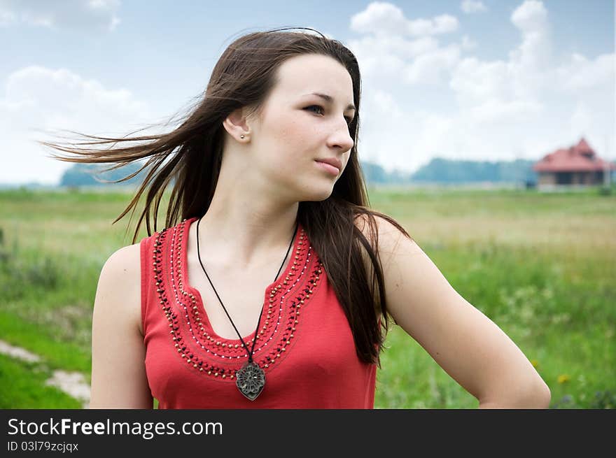 Young Girl On A Summer Meadow