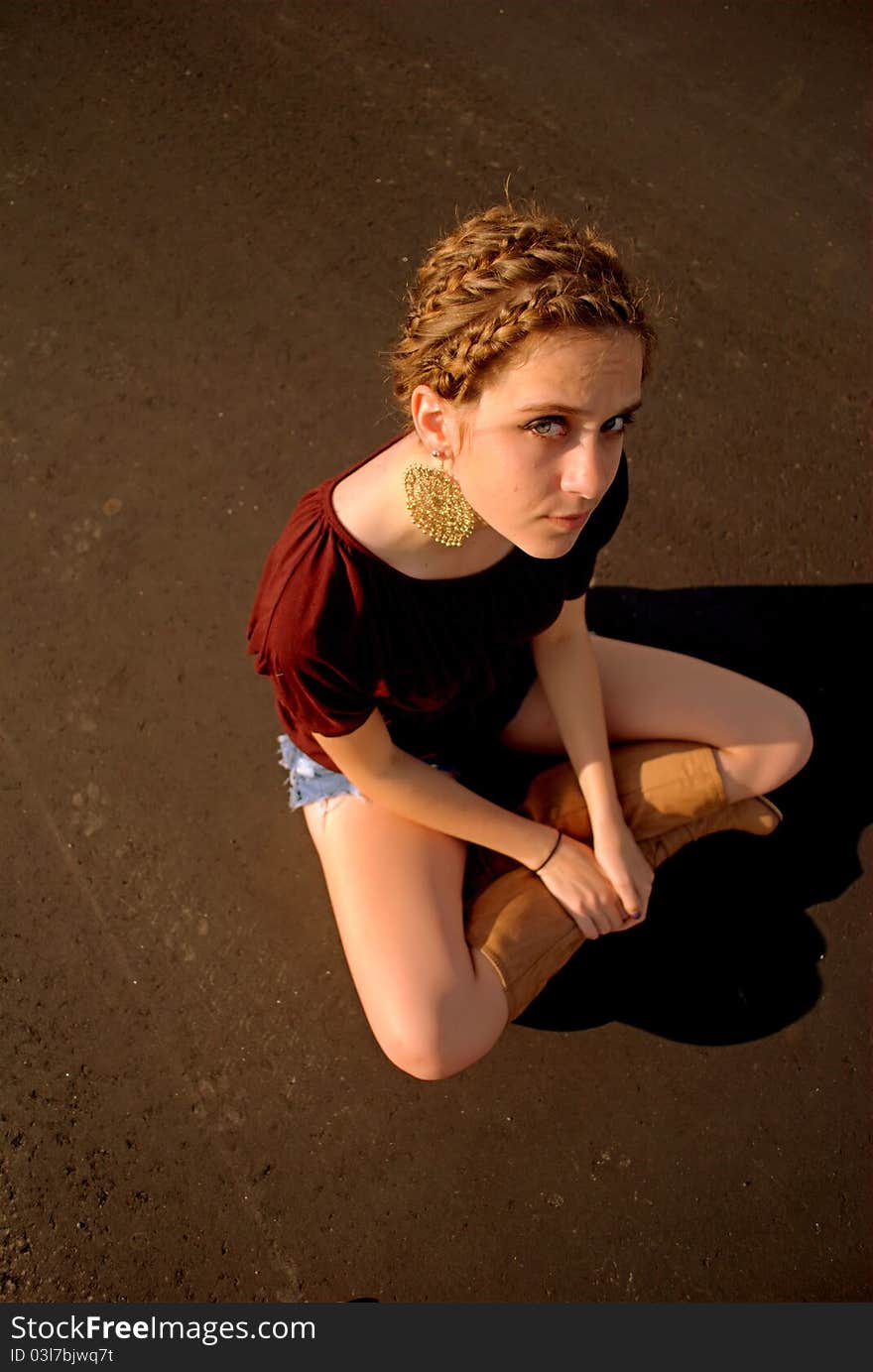 Teenager posing with braided hair. Teenager posing with braided hair.