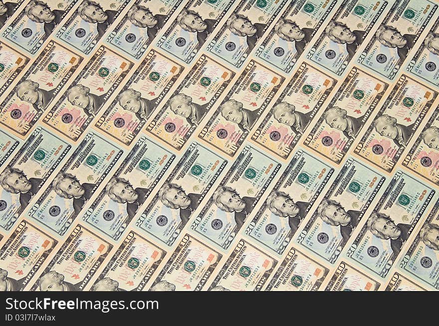 The background of U.S. dollars.
Banknotes of 10 and 20 dollars. The background of U.S. dollars.
Banknotes of 10 and 20 dollars