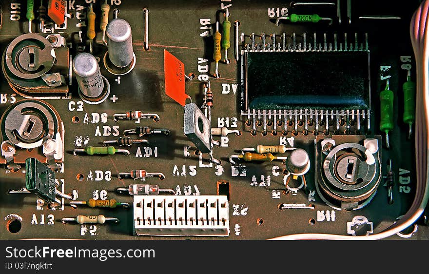 Old microcircuit with transistors, capacitors and conductors