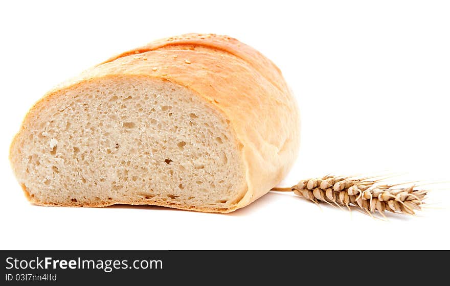 Spikelet wheat bread over white background