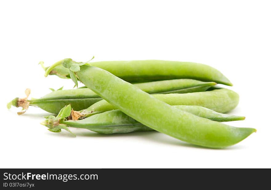 Green peas on a white background