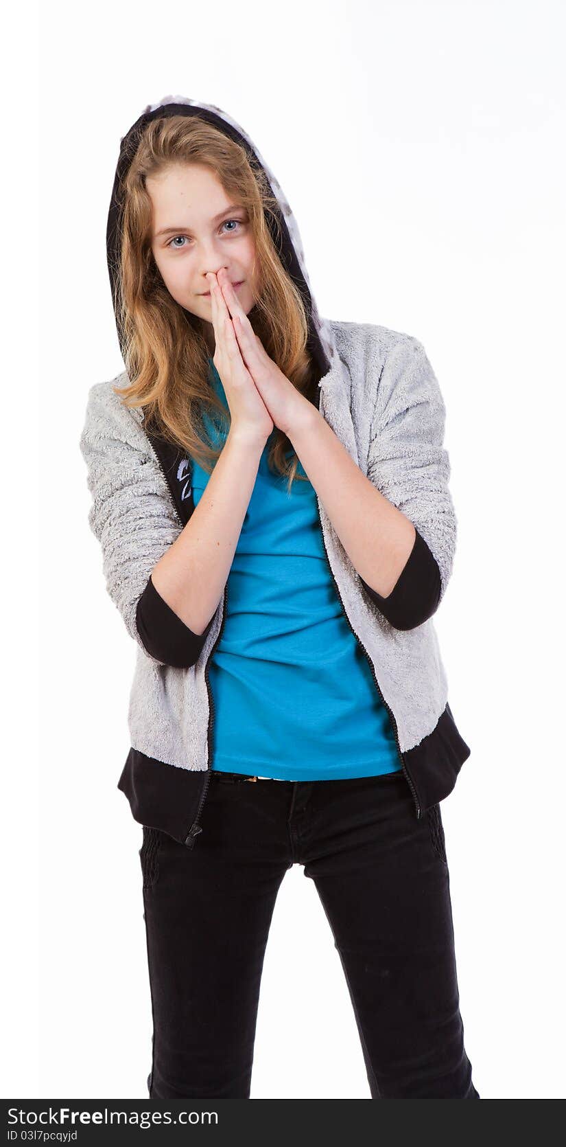 Portrait of happy girl teenager in studio on a white background