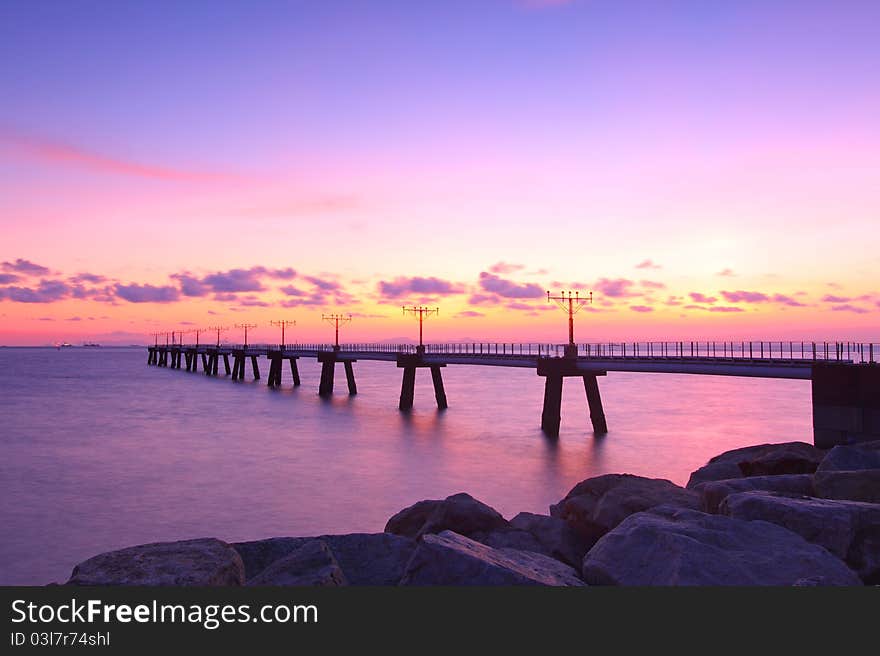 Sunset Along The Coast With Sea Stones