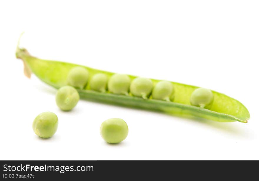 Green peas on a white background