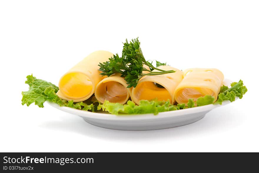 Cheese with greens in a bowl on a white background