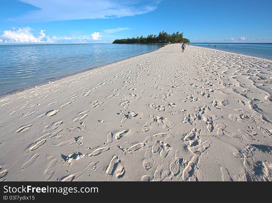 Sandy beach with footprints during low tide in Mataking. Sandy beach with footprints during low tide in Mataking