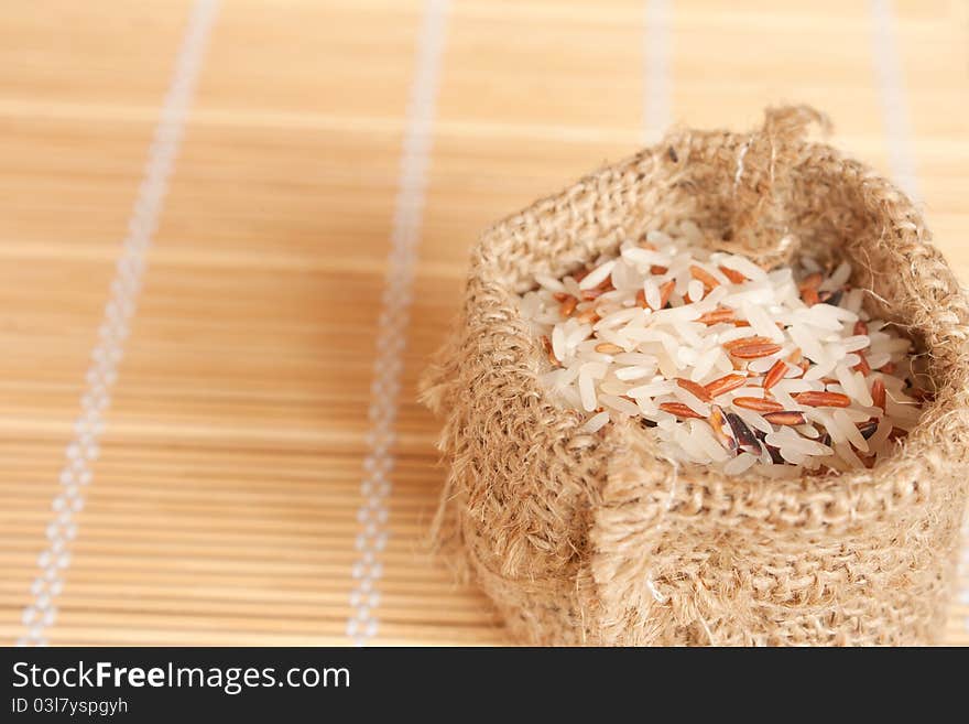 Raw rice in woven bag