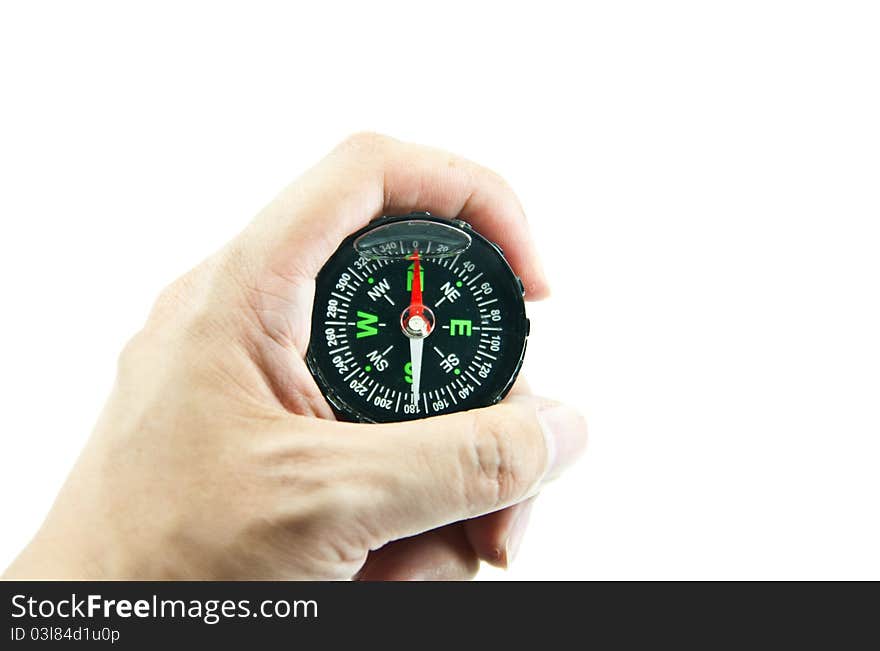 Hand holding a compass isolated on white background