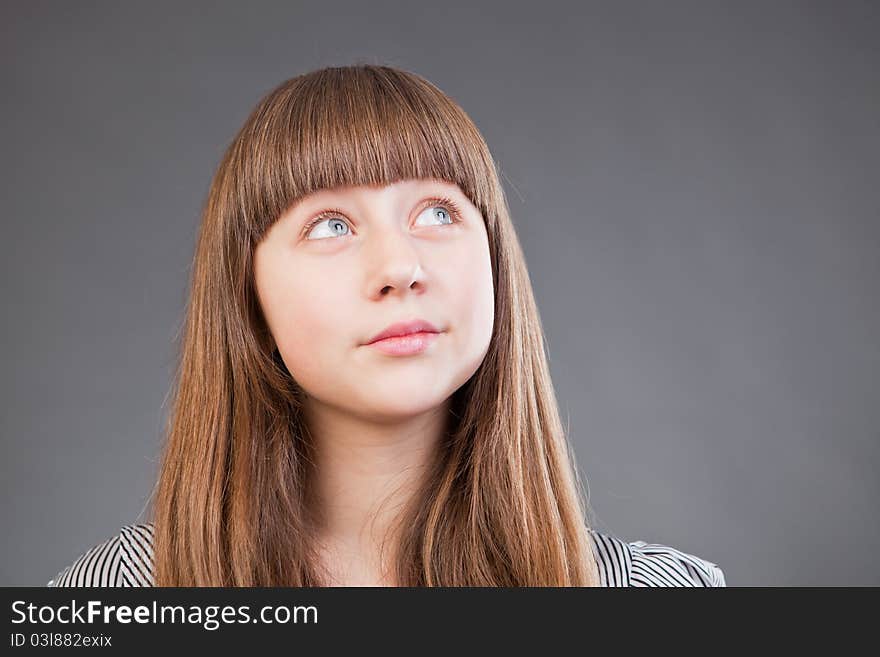 Portrait of beautiful young girl in studio