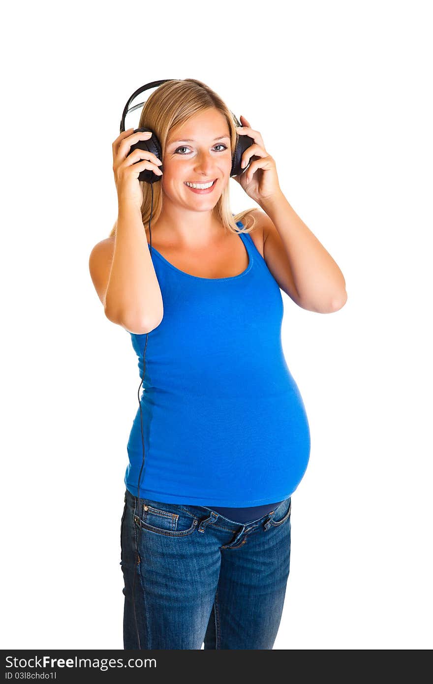 Pregnant woman with headphones