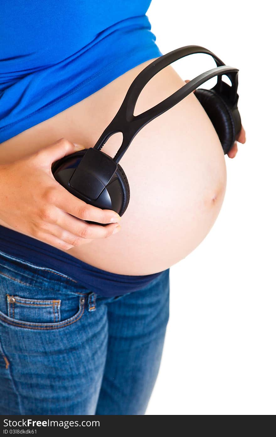 Pregnant Woman With Headphones