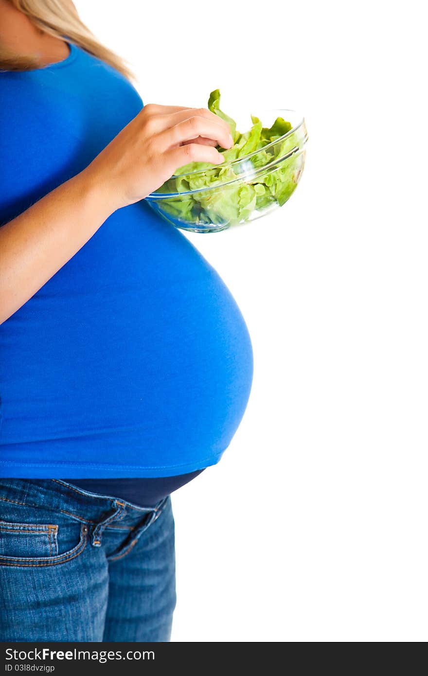 Pregnant woman with vegetables