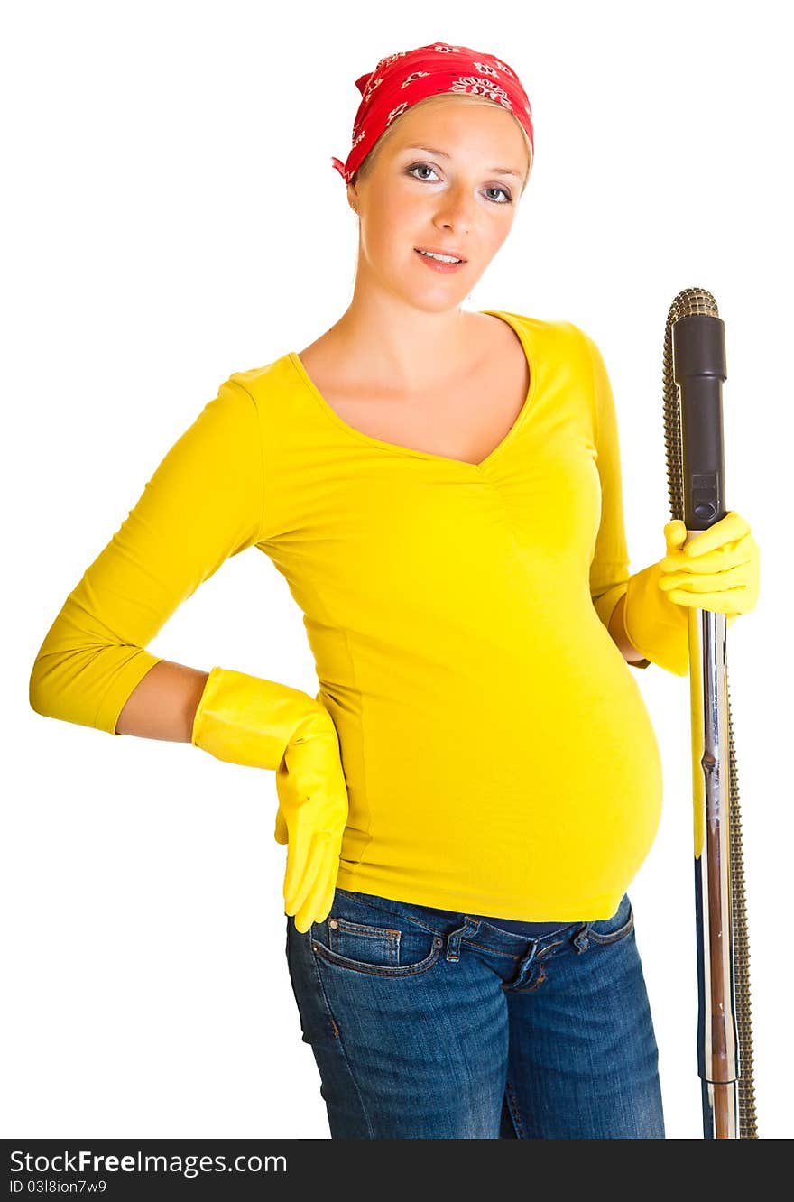 Pregnant woman clean with vacuum