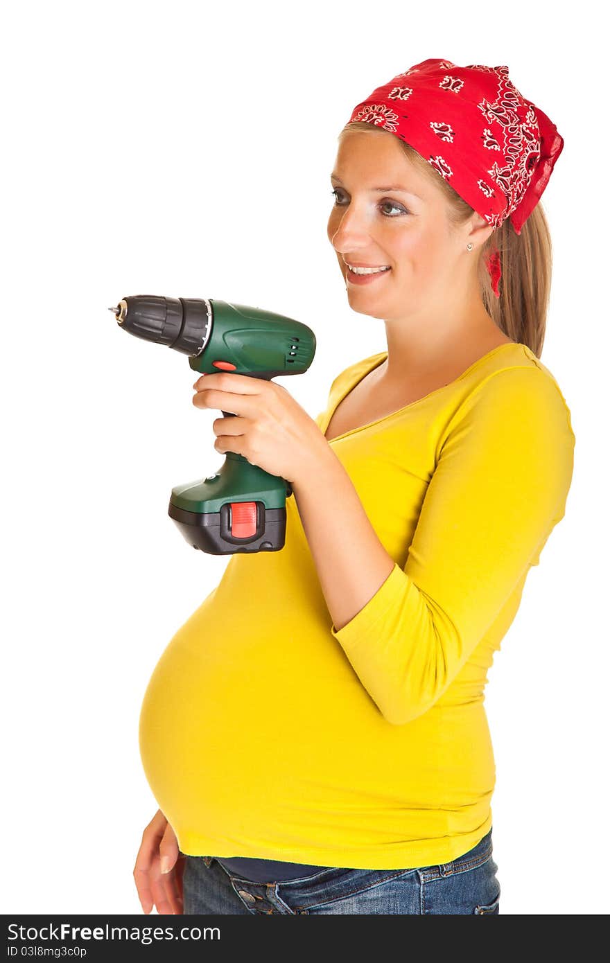 Pregnant woman with powertools