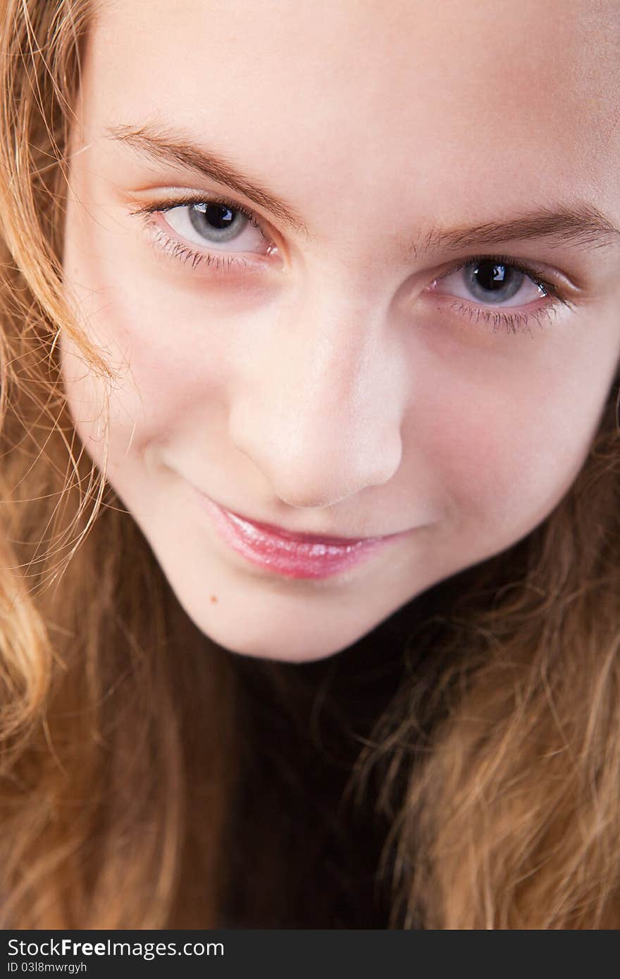 Portrait of a beautiful girl in studio. Portrait of a beautiful girl in studio.