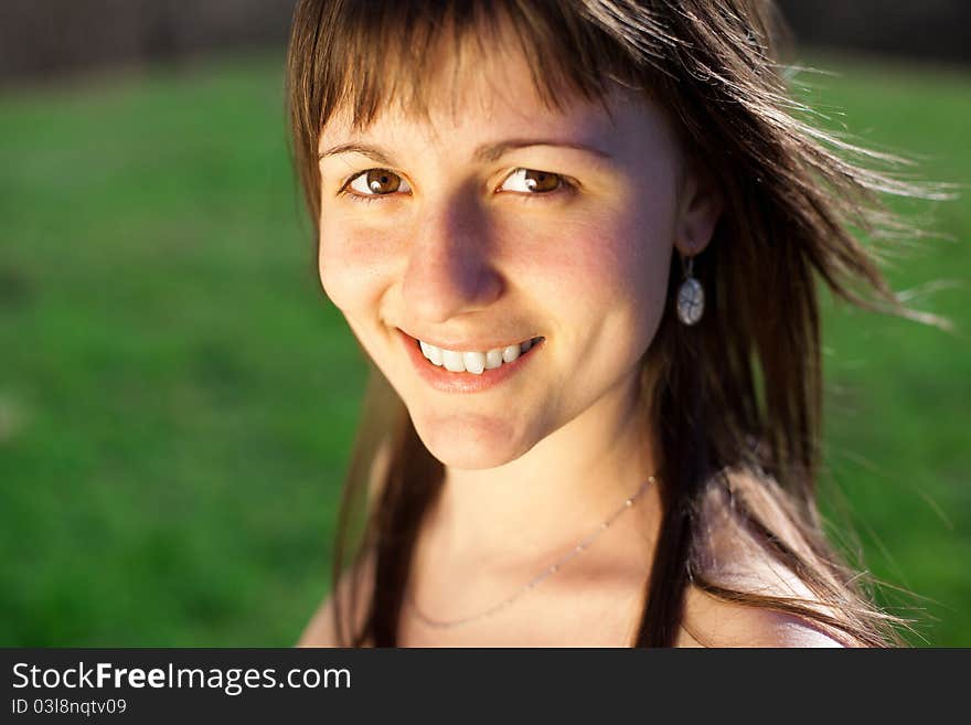 Portrait of a beautiful young woman outdoor