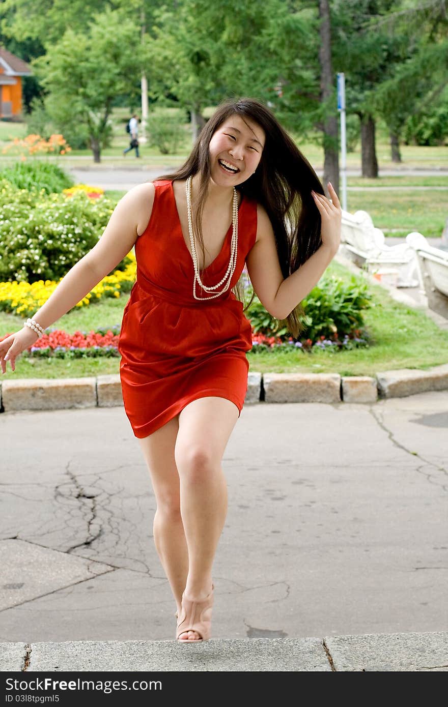 Girl walking outdoor in summer