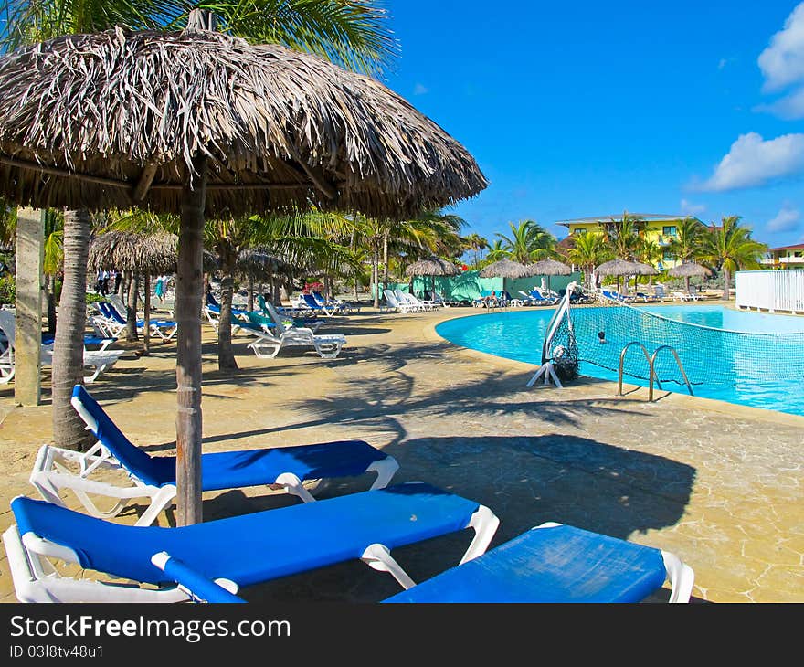 Relaxing Swimming Pool at Playa Blanca beach resort in Cayo Largo, Cuba (Caribbeans). Relaxing Swimming Pool at Playa Blanca beach resort in Cayo Largo, Cuba (Caribbeans)