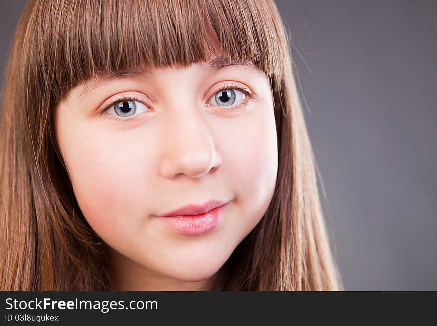 Portrait of a beautiful girl in studio. Portrait of a beautiful girl in studio.